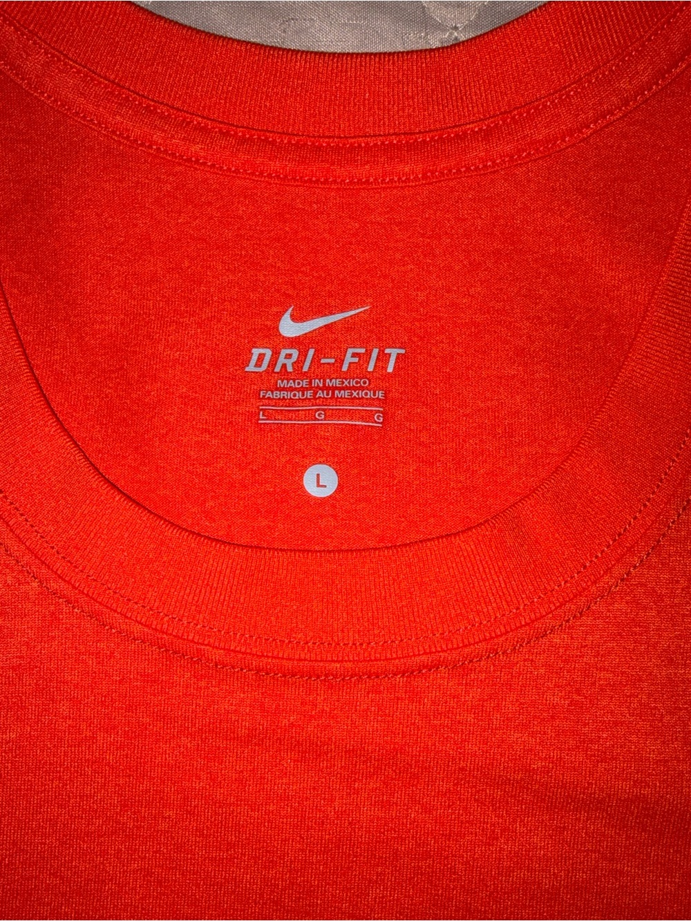 Nike women’s orange Dri-FIT Short Sleeve tank top